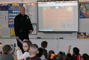 Officer Sean teaching students