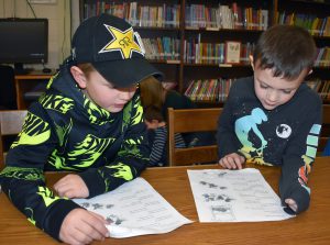 two boys involved in partner reading