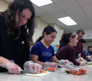 students making homemade soup
