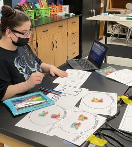 student in mitosis lab