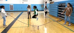 girls jumping rope