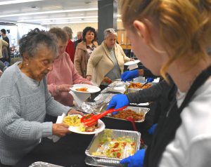 senior citizens taking food
