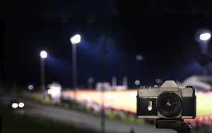 night time at High school with camera