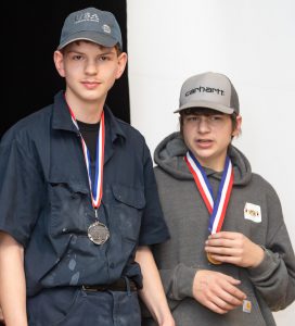 Two students with medals